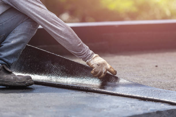 Professional Basement Waterproofing technician working in Windfall, IN
